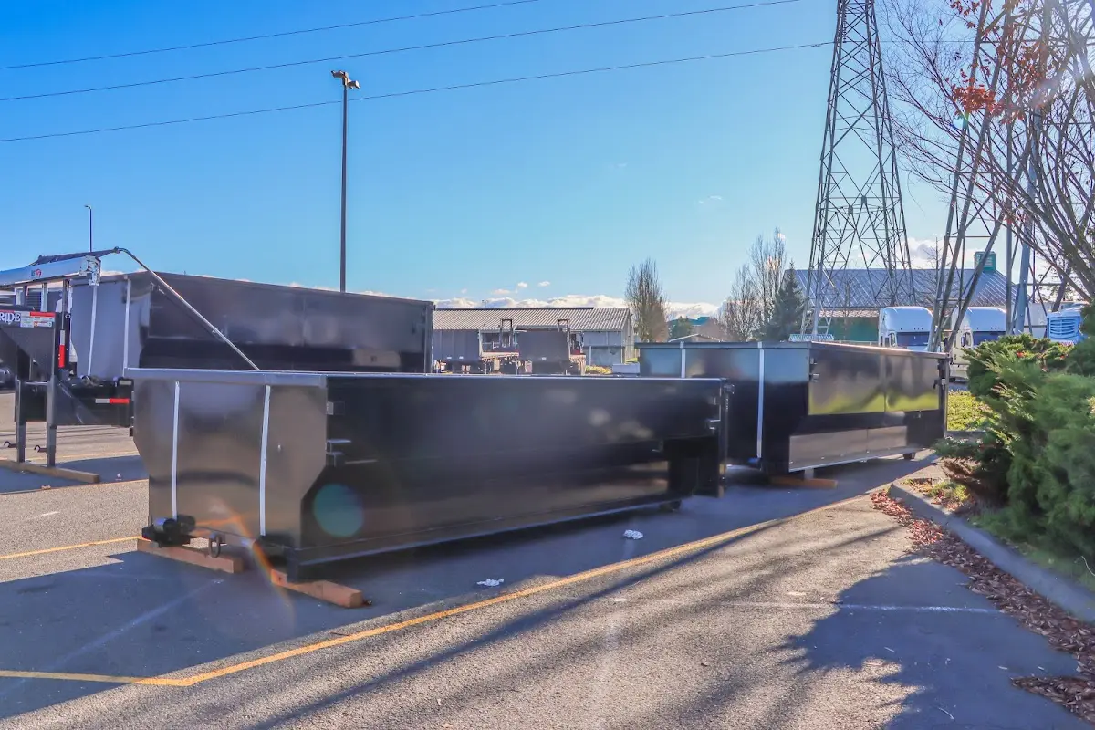 Roll-off dumpster ready for waste disposal at job site for 2 Yard Dumpster Rental in Fort Wayne